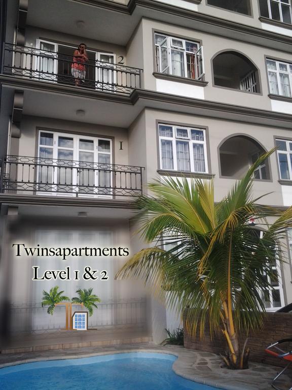 Twins Apartments Flic en Flac Номер фото