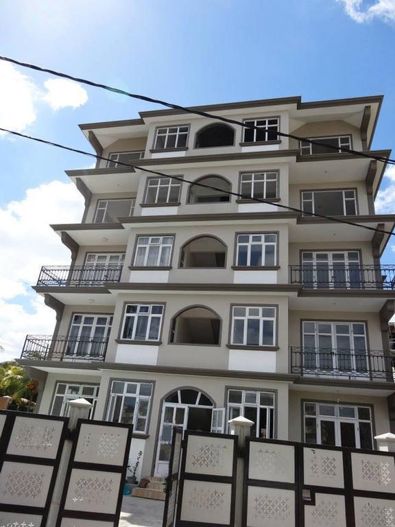 Twins Apartments Flic en Flac Номер фото