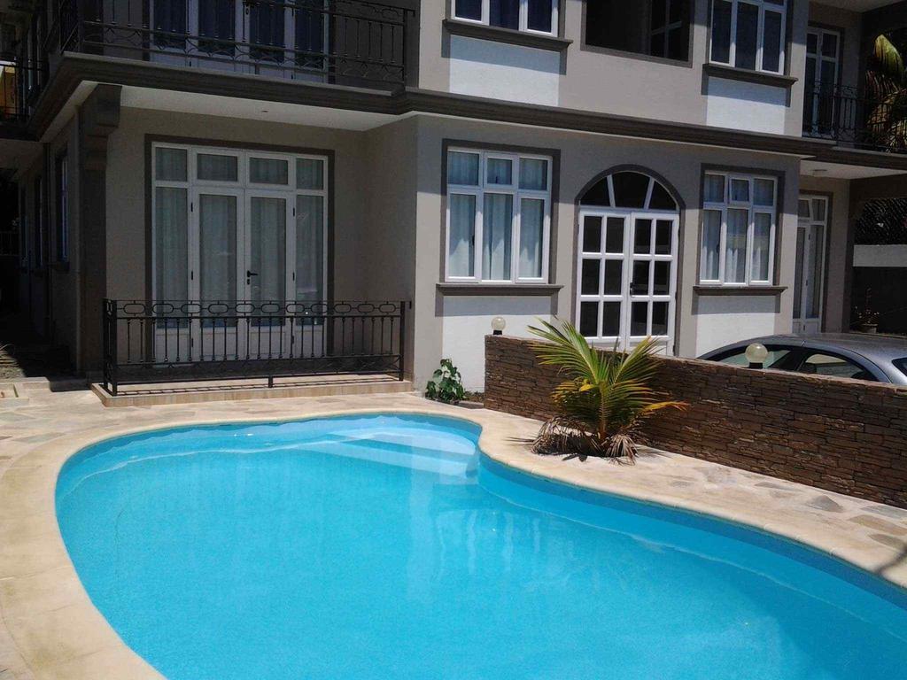 Twins Apartments Flic en Flac Номер фото