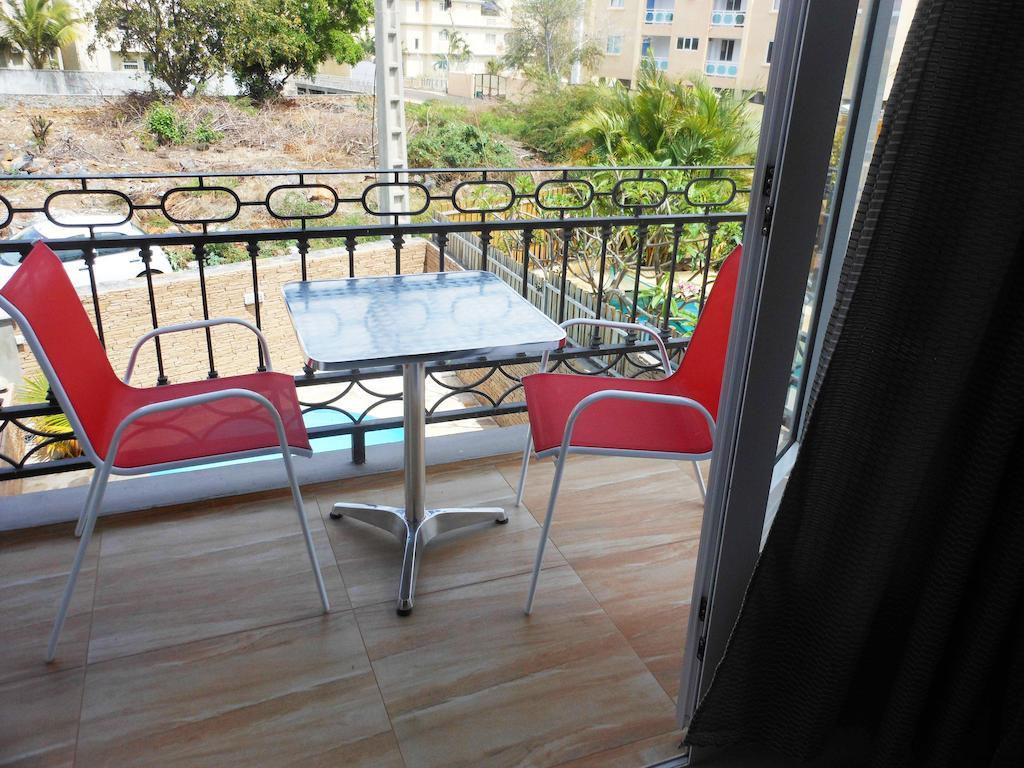 Twins Apartments Flic en Flac Номер фото